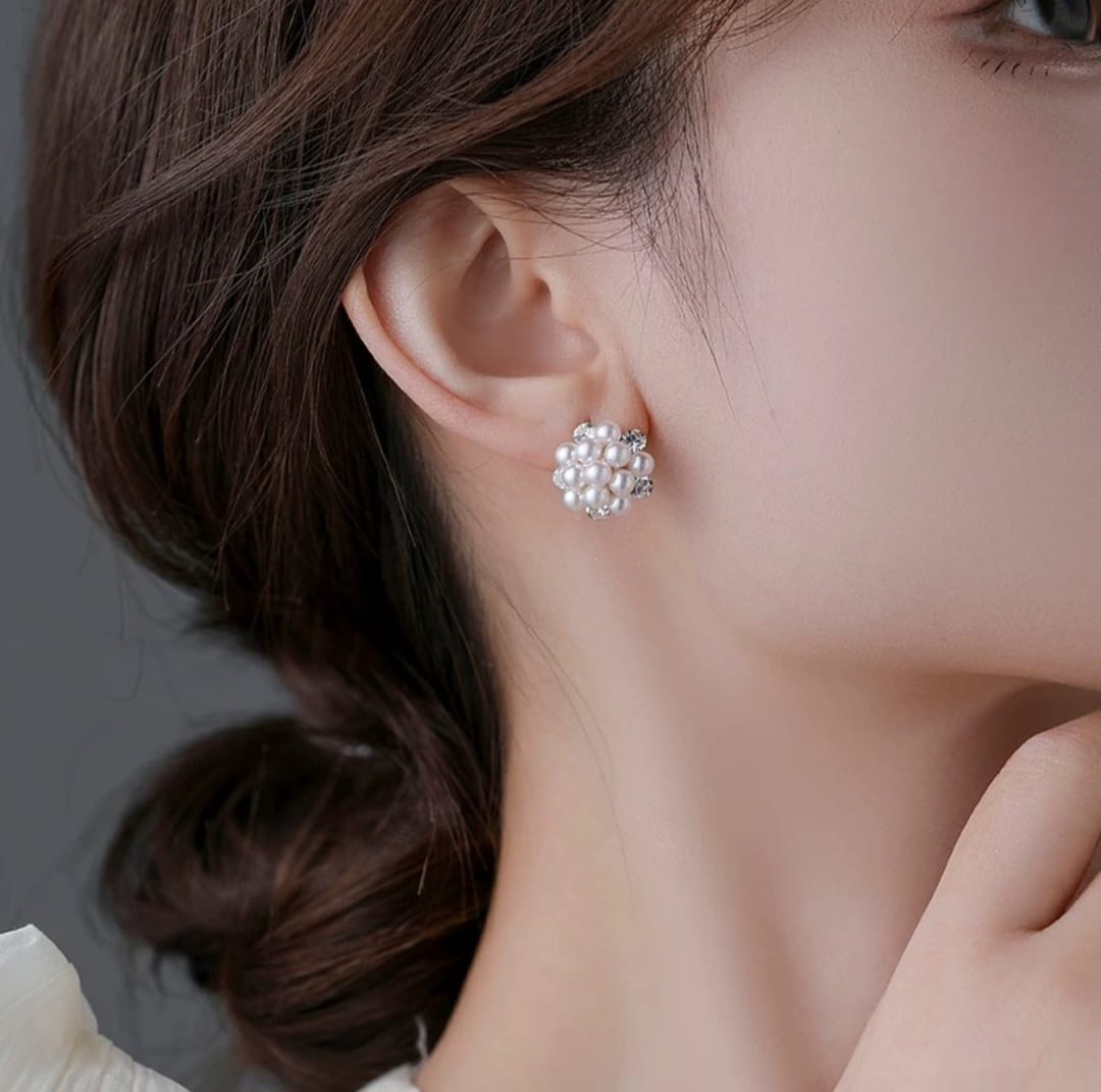 Sparkling Pearl Earrings with Silver Detailing