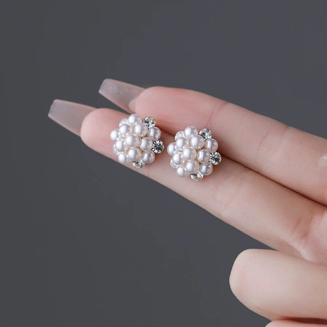 Sparkling Pearl Earrings with Silver Detailing